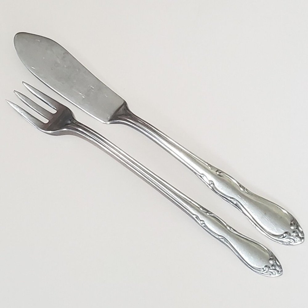 2pc Oneida Homestead Butter Knife & Cocktail Fork stainless Simeon George Roger
